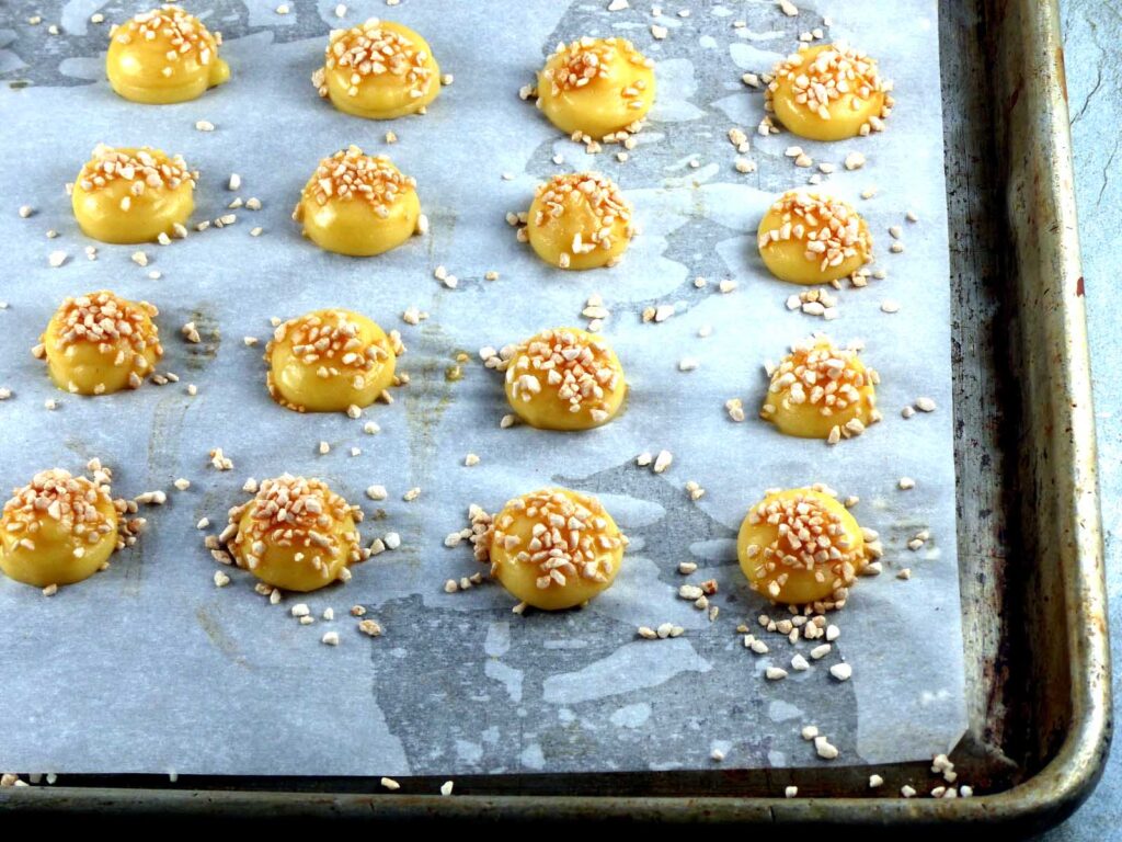 Chouquettes on cookie sheet